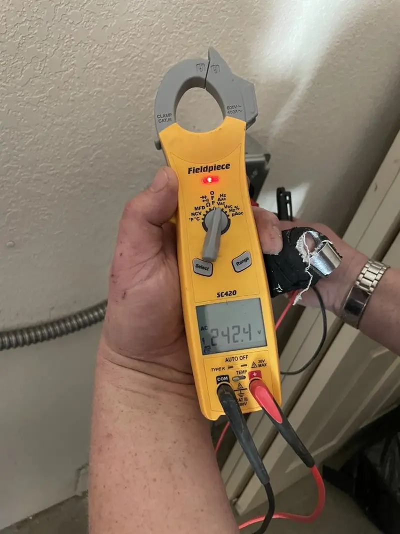 Voltage testing with clamp meter during Generator Installation in North Hempstead